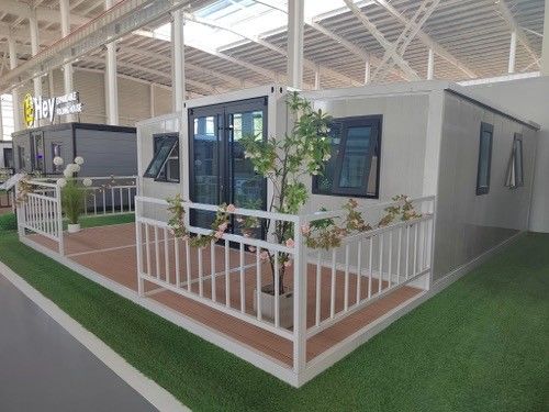 Contenedor plegable de 20 pies ideal para proyectos emergentes temporales EPS / PU / panel de sándwich de lana de roca Duración de vida Más de 20 años